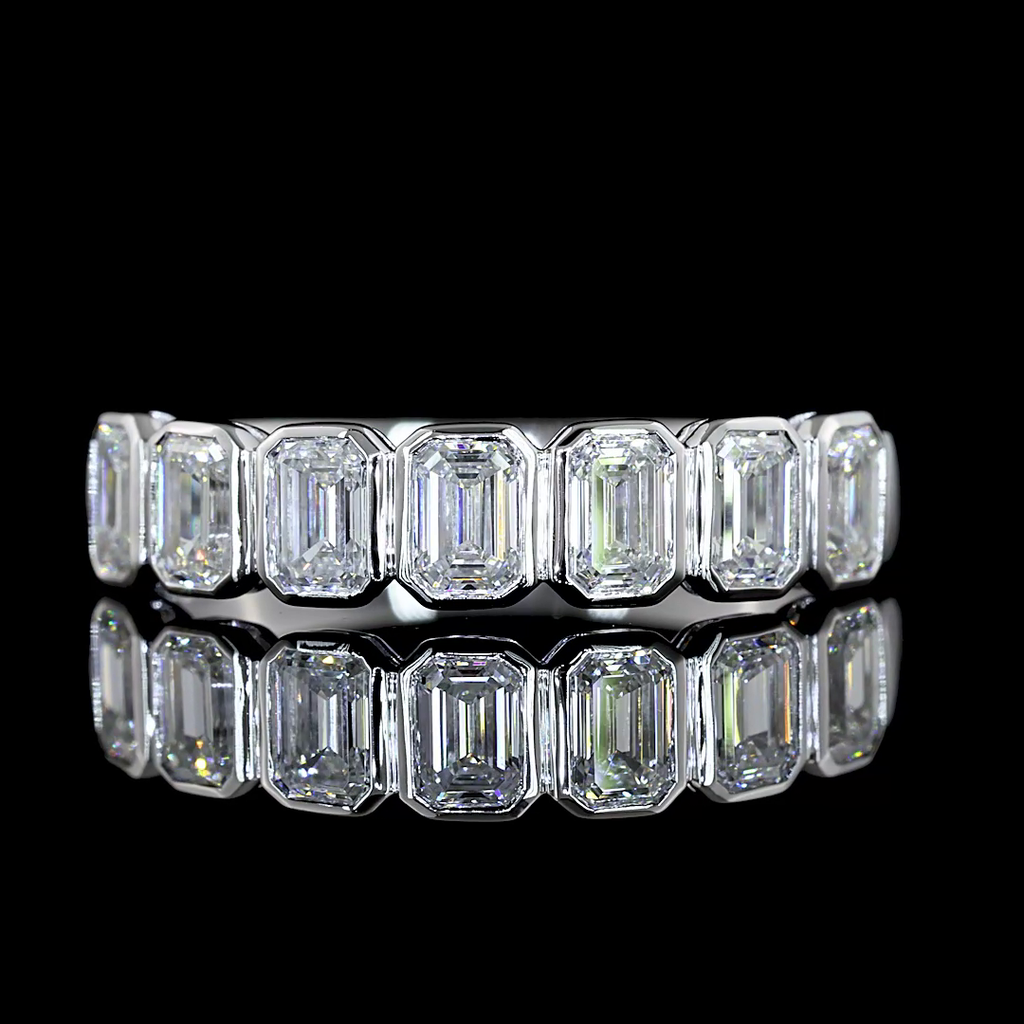 0.99 Cts 14k White Gold Emerald Shape 7 Stones Eternity Band - Video