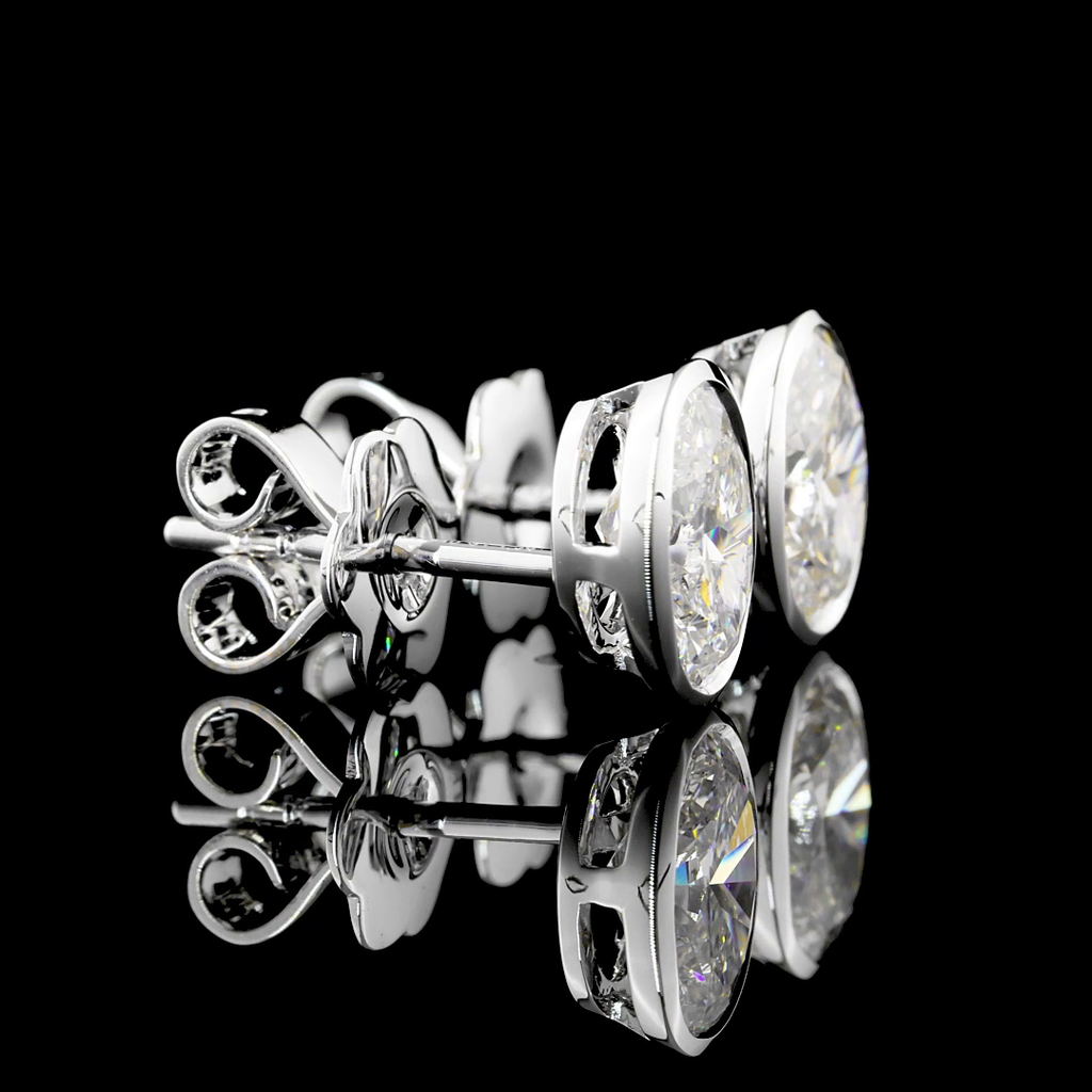 1.56 Cts 14k White Gold Oval Shape Studs Earring - Image 2