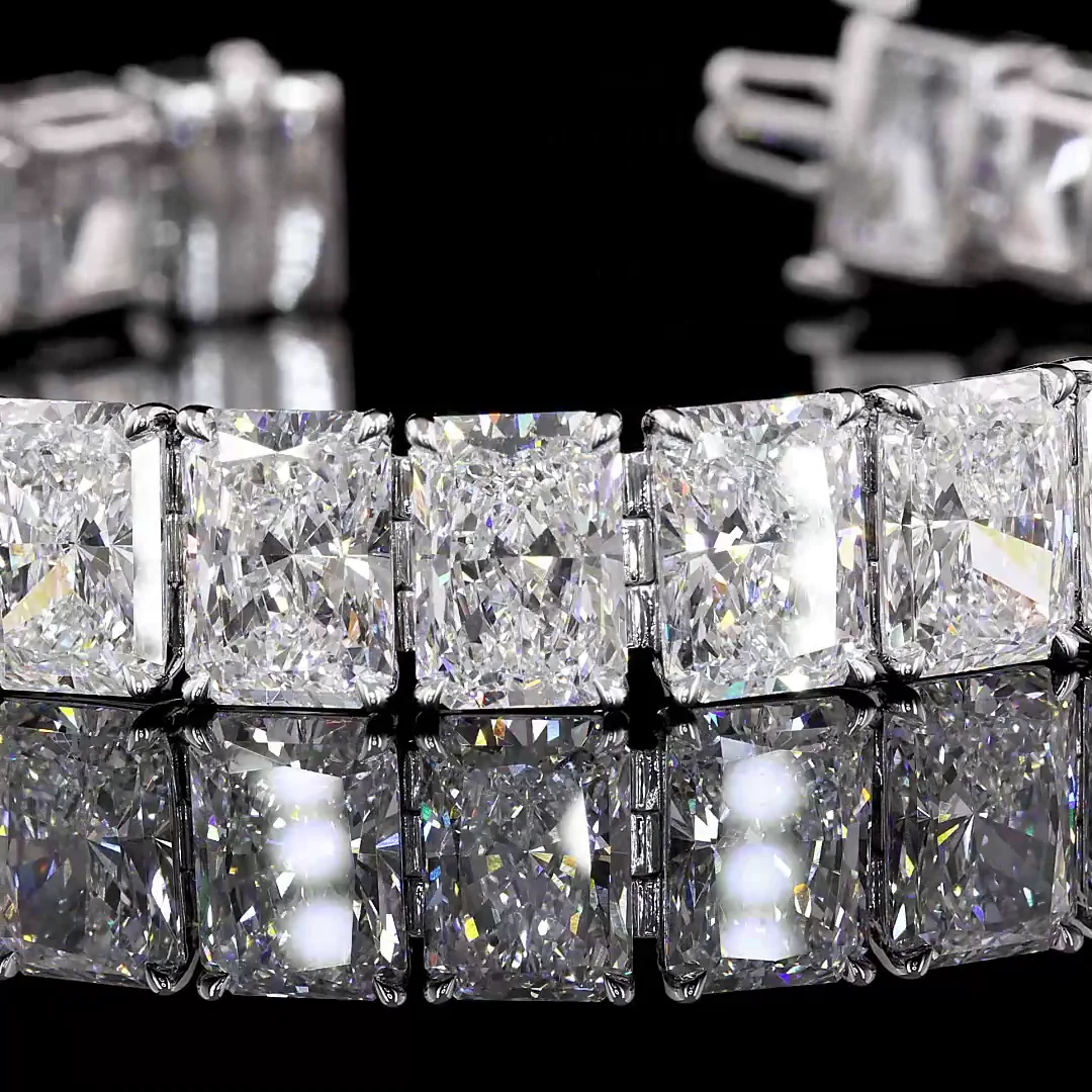 53.79 Cts 18k White Gold Radiant Shape Tennis Bracelet - Image 2
