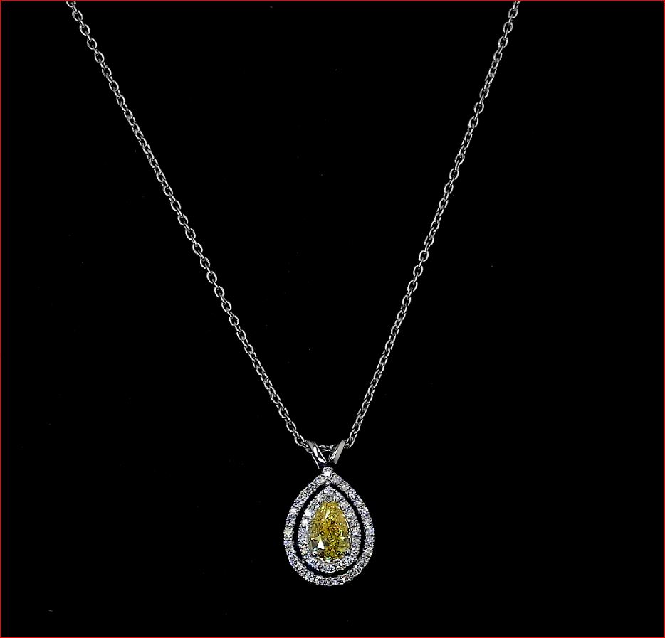 0.77 Cts 14k White Gold Pear Shape Double Halo Pendant