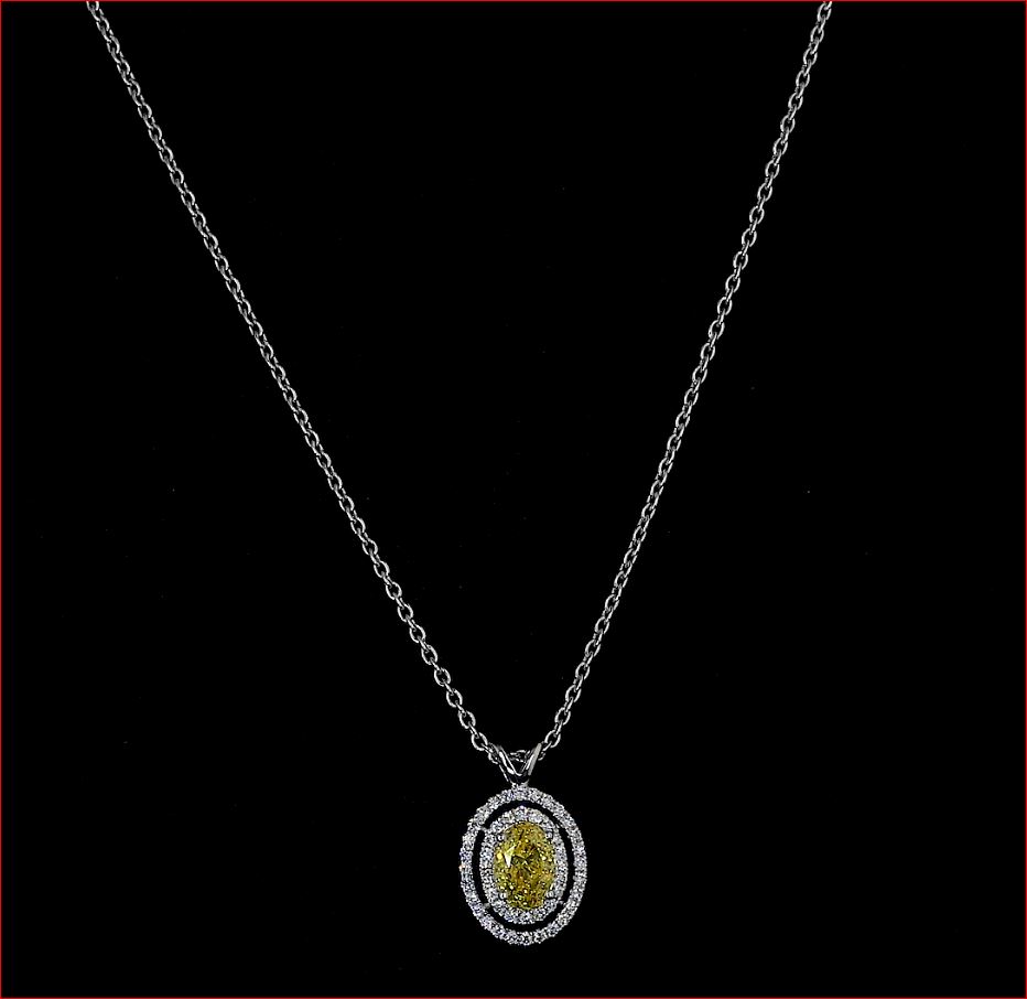 0.68 Cts 14k White Gold Oval Shape Double Halo Pendant