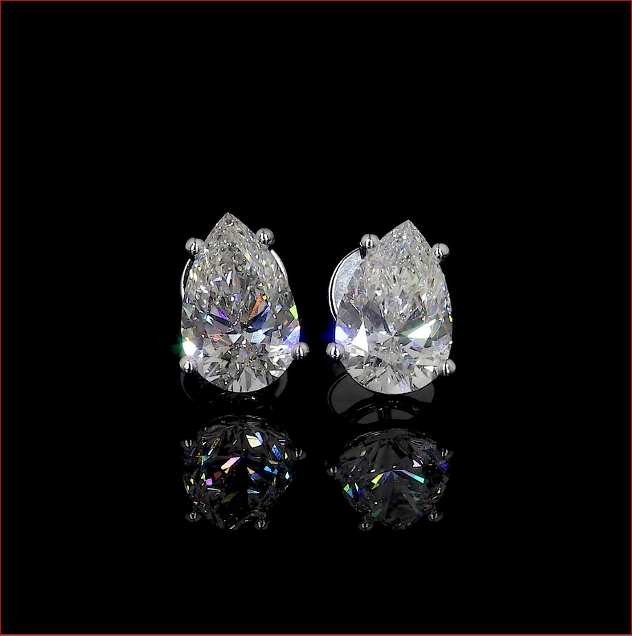 1 Cts 18k White Gold Pear Shape Studs Earring