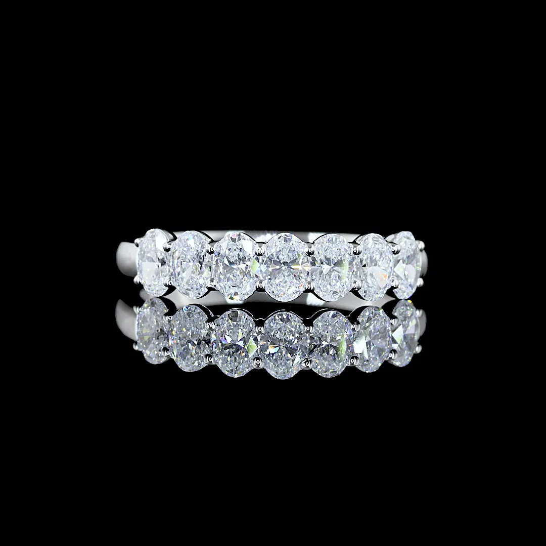 0.94 Cts 14k White Gold Oval Shape 7 Stones Eternity Band